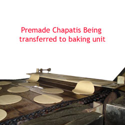 Pre-mad chapati being transfered to backing units